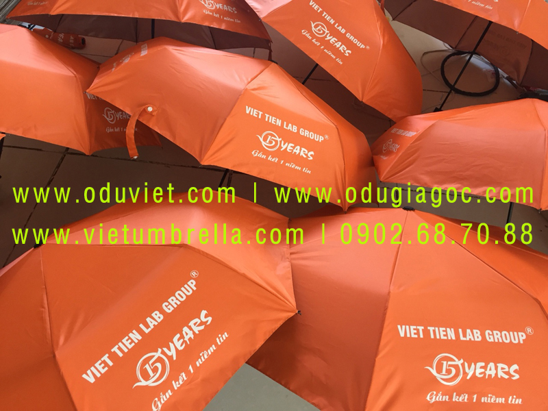 xưởng sản xuất ô dù cầm tay in logo quảng cáo
